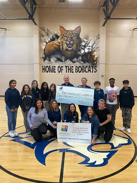 Dr. Harmon donates $1000 to First Colony Middle School